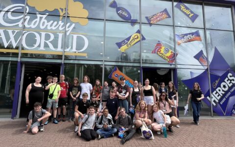 A group of students outside Cadbury World
